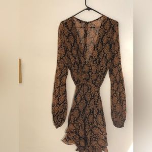 Ruffled black and brown dress. Gently loved.